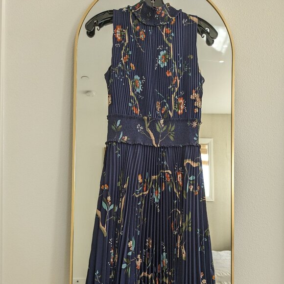 Nanette Lepore Dresses & Skirts - Nanette Lepore sleeveless blue floral pleated dress